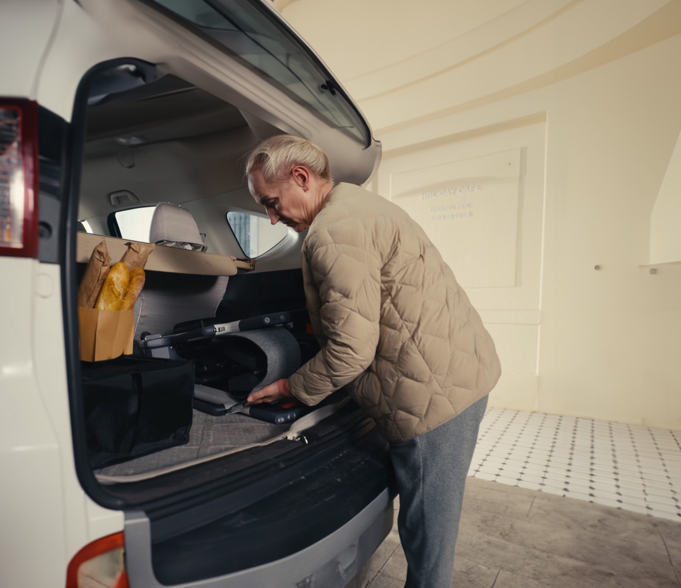 Roamate folded into a car trunk for travel storage
